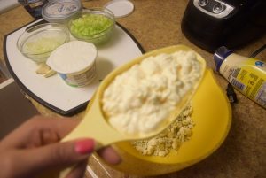 mixing cream cheese