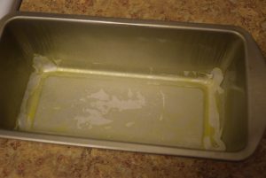 Tin greased with butter or oil